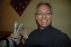 Rich man: how much money do I hold in my hand? Hint: there are 320 bank notes