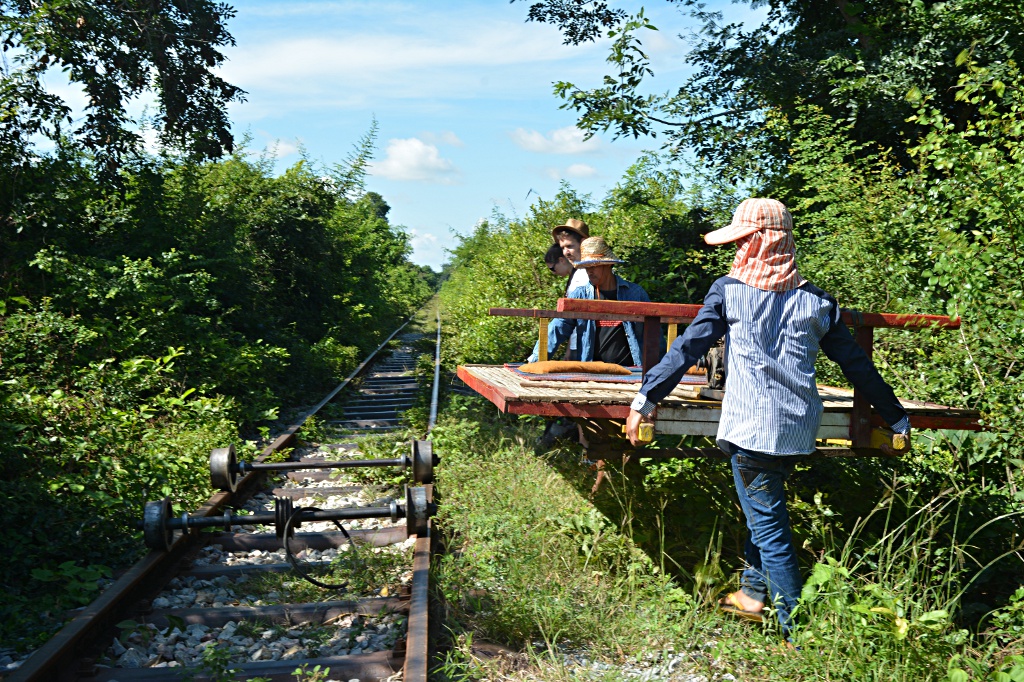 Creative tinkering, dis- and reassembling a bamboo train when crossing